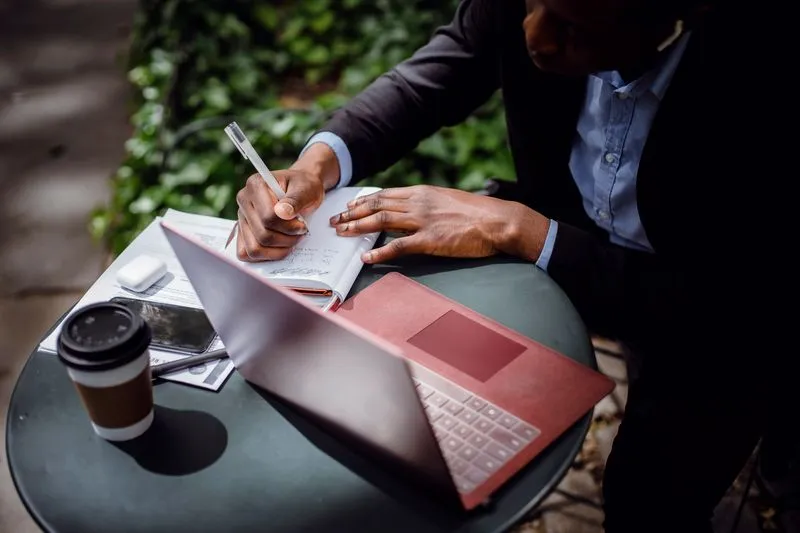 A writer working on an article at a news desk