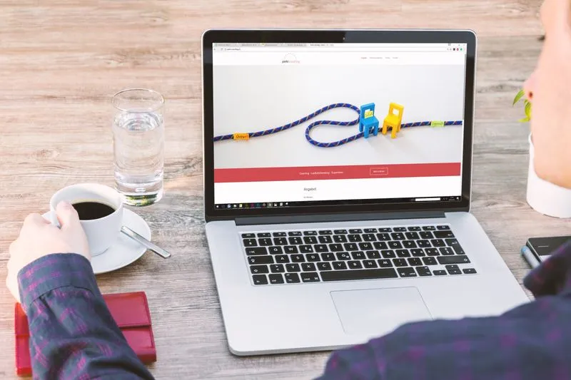 A business website open on a laptop