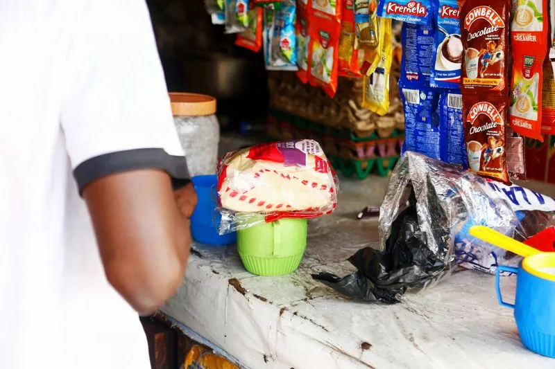 Business owner weighing a decision at the counter